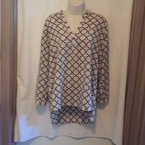 Polyester high low blouse.  Beige and black